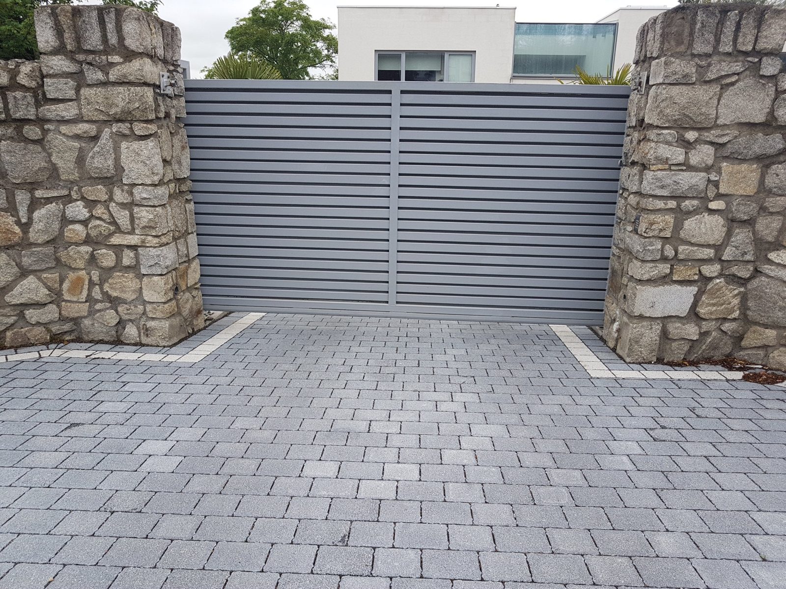 Slatted gates like these for homes in Newtownards