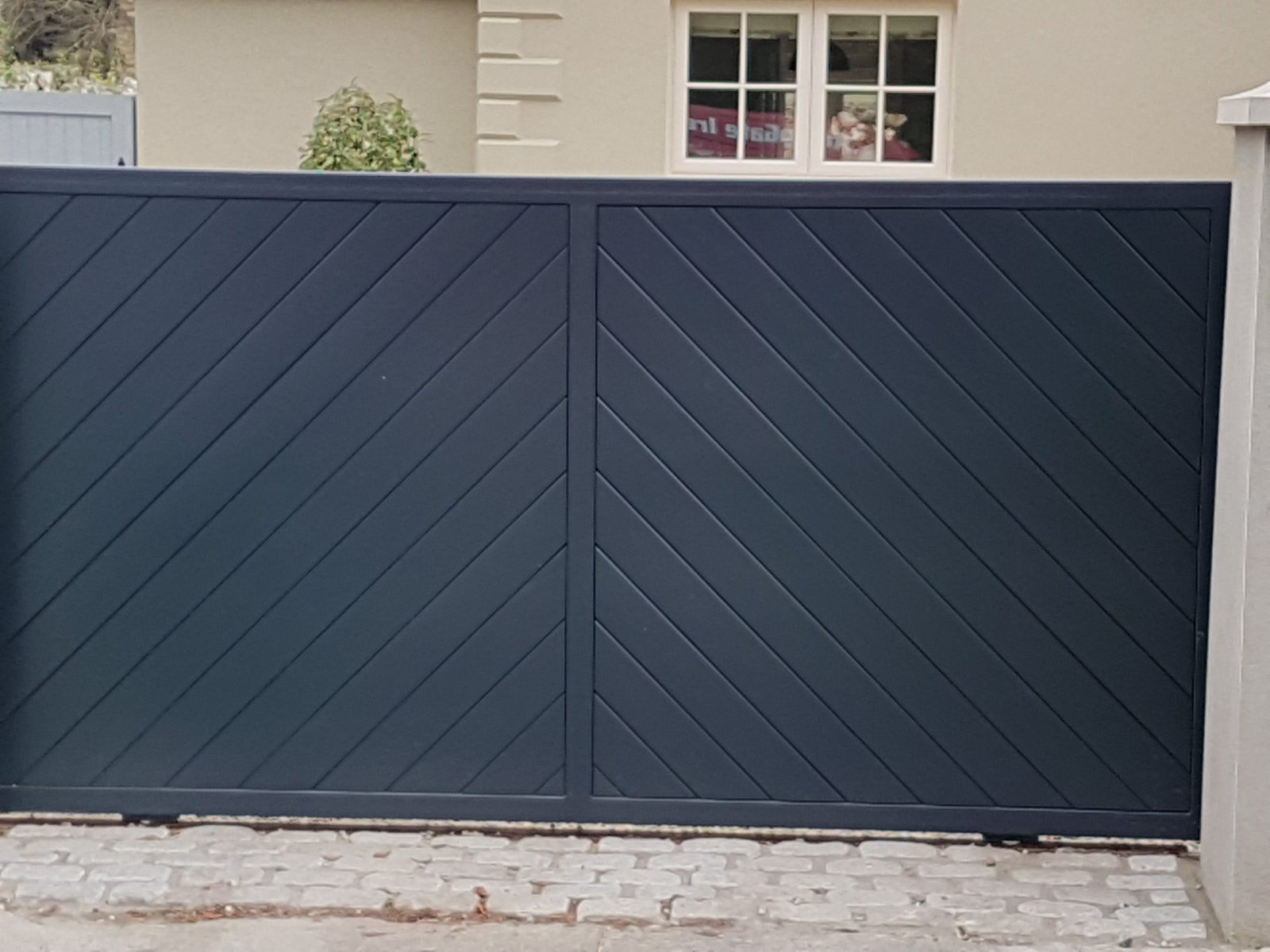 Herringbone-panel gates like these for homes in Silverbridge