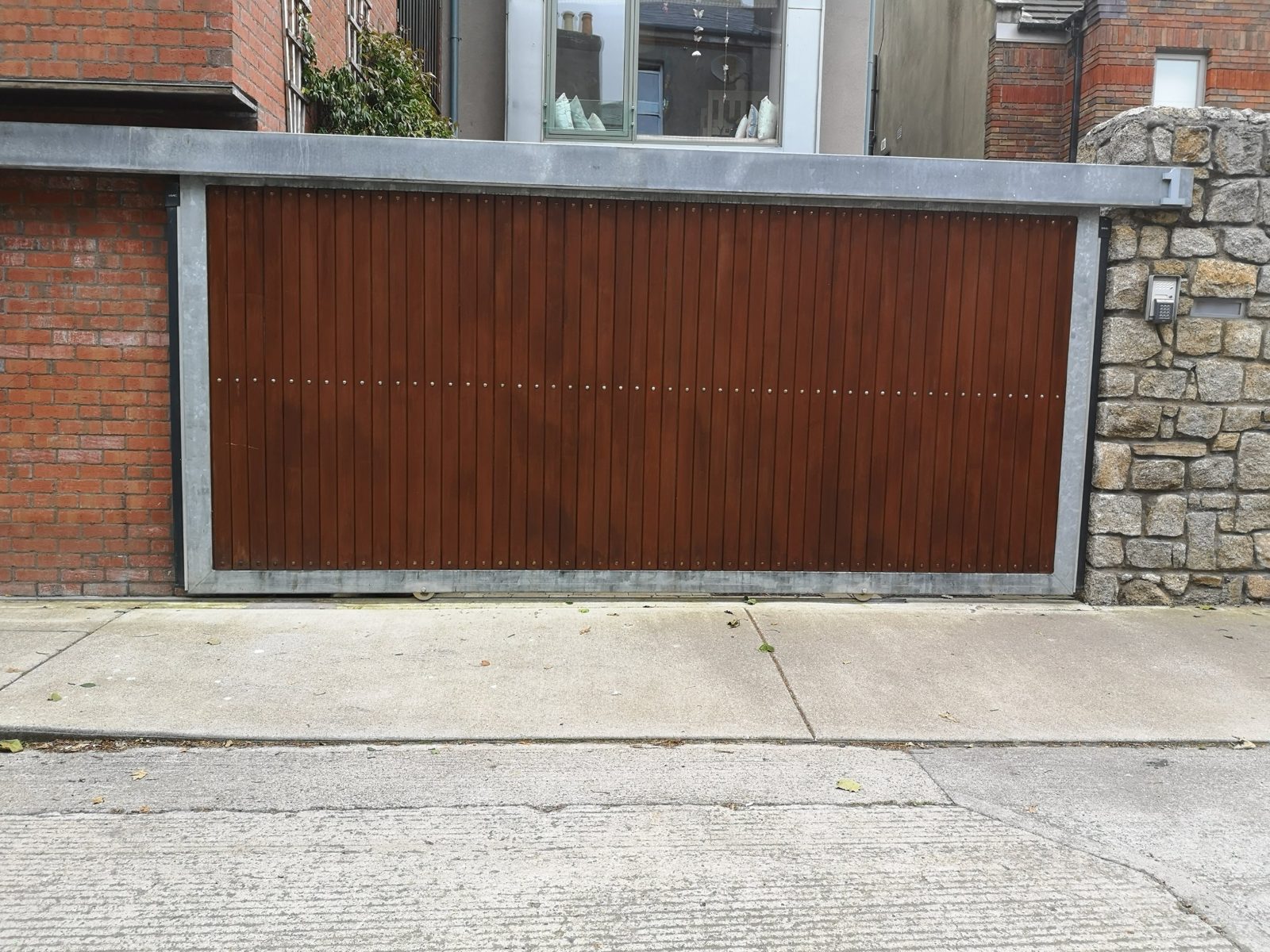 Hardwood sliding gates like these for homes in Belfast